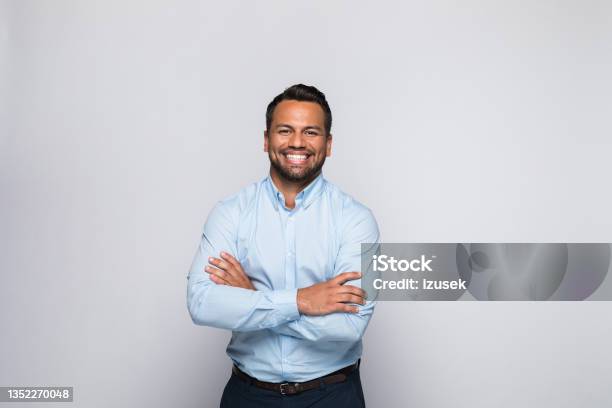 Portrait Of Cheerful Mid Adult Businessman Stock Photo - Download Image Now - Men, Latin American and Hispanic Ethnicity, Businessman