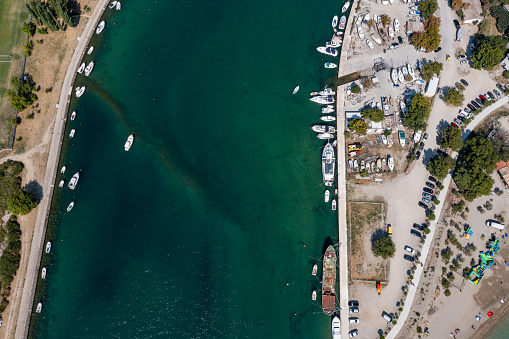 Drone aerial view of Omis and Cetina river, Dalmatian Coast, Croatia \nAerial view of Omiš town in Croatia