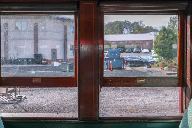 istock The train old window with layers of paint. 1352277573