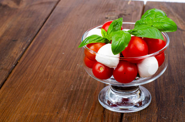 Caprese salad in glass. Studio Photo