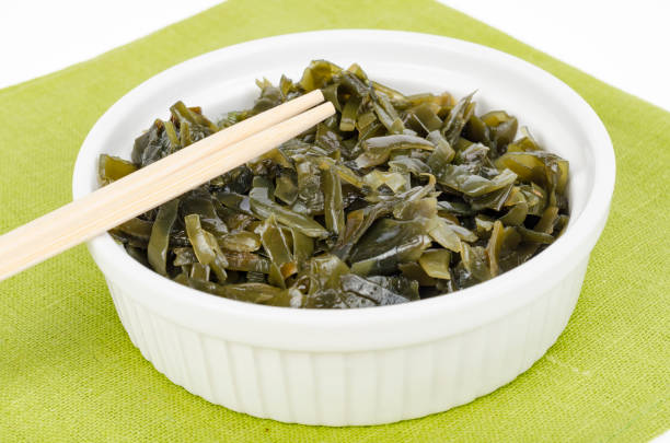 the Pickled seaweed, vegan menu. Studio Photo Pickled seaweed, vegan menu Studio Photo sunomono stock pictures, royalty-free photos & images