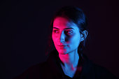 Young woman portrait with neon colors