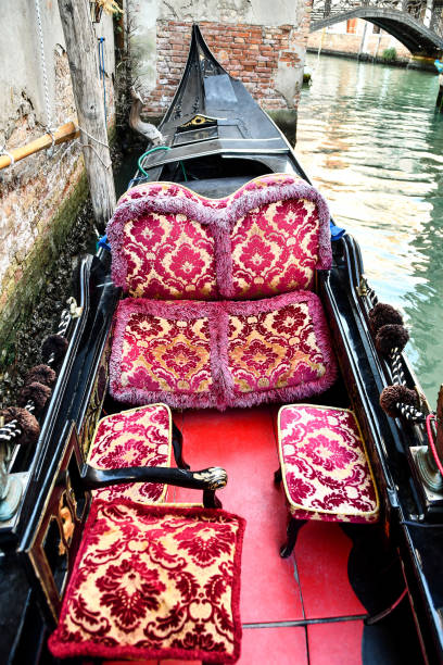 istock gondolas in venice, digital photo picture as a background 1352283595