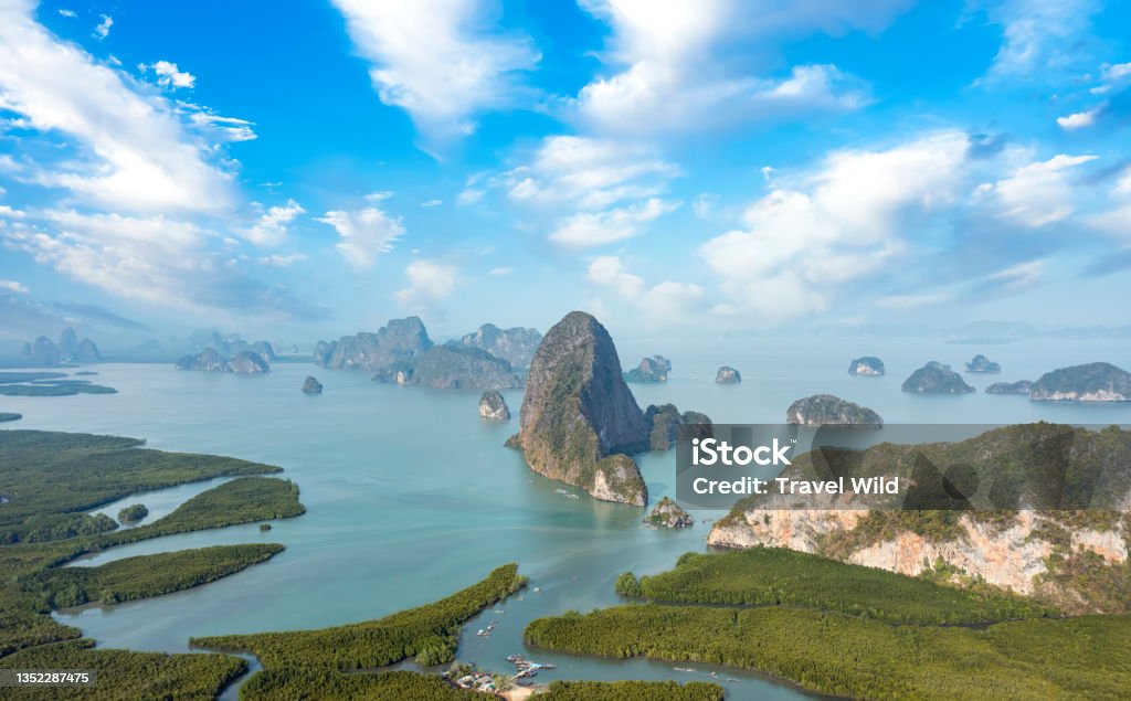 View from above, stunning aerial view of Phang Nga Bay (Ao Phang Nga National Park) with the sheer limestone karsts that jut vertically out of the emerald-green water, Thailand. Phang-Nga Bay Stock Photo