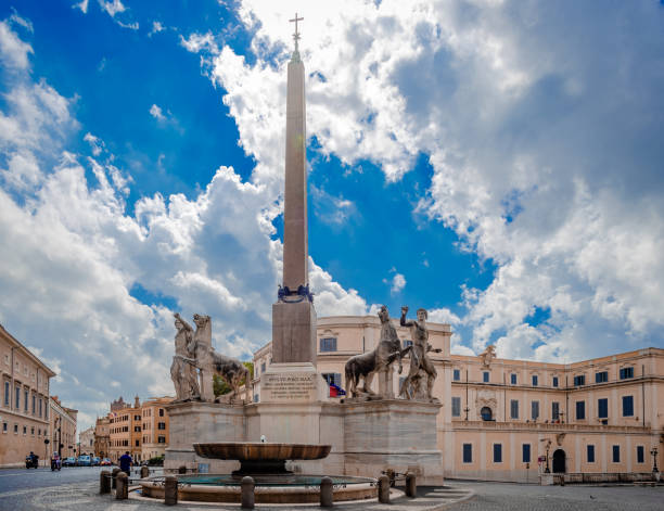 Piazza del Quirinale on the Quirinal Hill in Rome, Italy. The Piazza del Quirinale on the Quirinal Hill, one of the most beautiful squares in Rome, with the Dioscuri fountain, the 14 m high obelisk and the 6 m high horse tamers Castor and Pollux. quirinal palace stock pictures, royalty-free photos & images