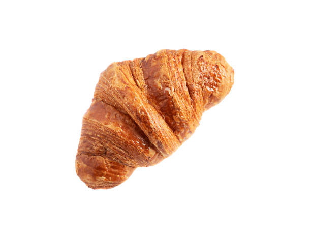 istock Croissant one isolated on a white background. 1352289394