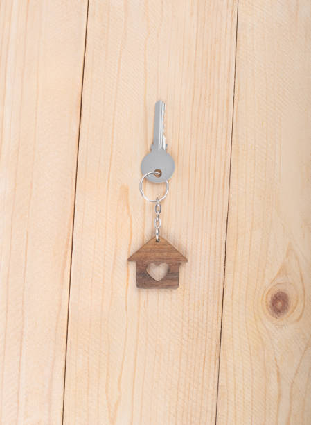 istock key on the keychain in hand 1352292497