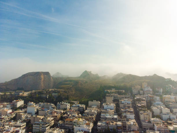 istock A day in Athens with fog 1352292882