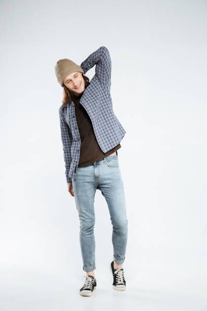 istock Vertical image of hipster holding head 1352296354