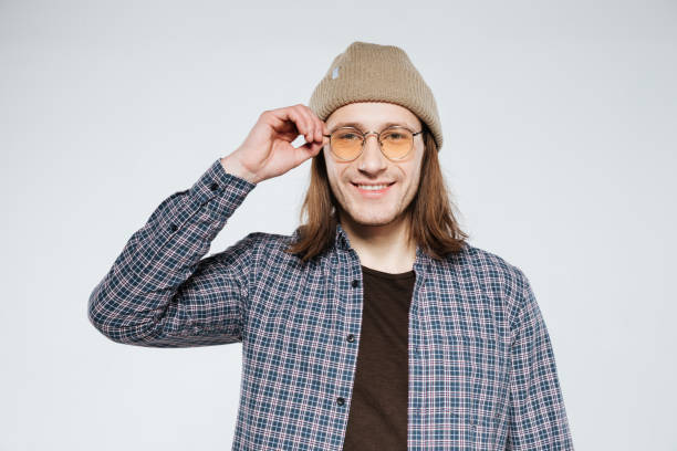 istock Smiling hipster in eyeglasses 1352296604