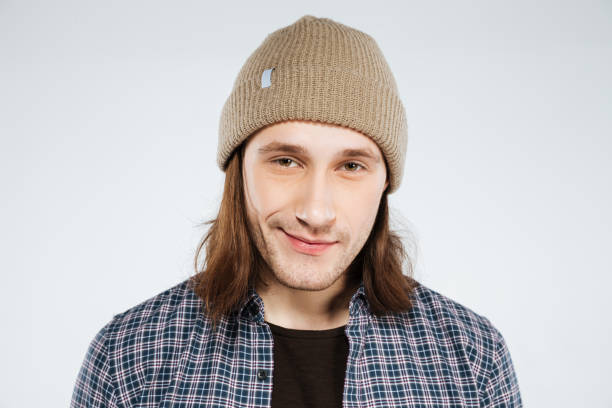 istock Young hipster in shirt and hat 1352296631