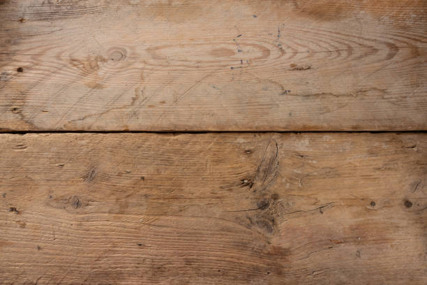 istock rustic wooden planks with scratches and stains as full frame background texture, copy space 1352297457