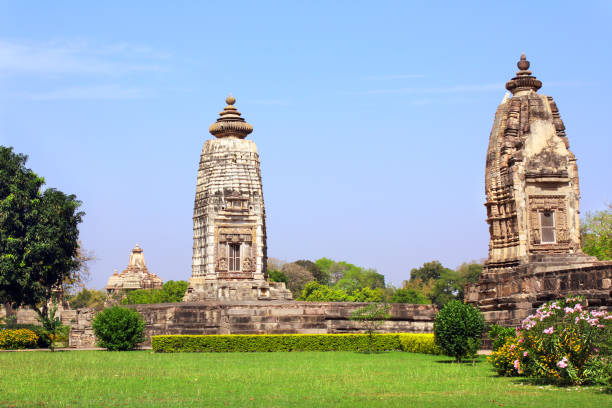 istock Ancient stone temples in Khajuraho, Madya Pradesh, India 1352297975