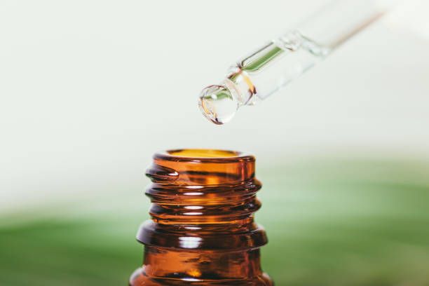 istock Organic pure essential oil in pipette 1352299165