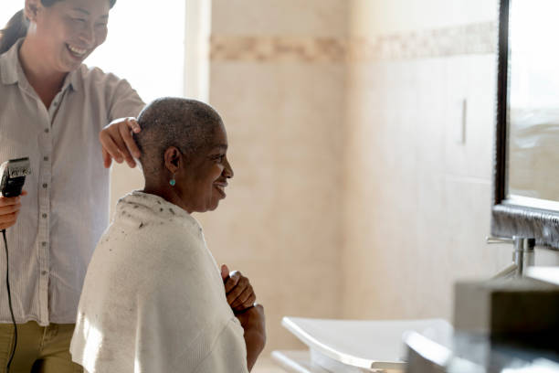 istock Brushing Off a Friends Head After Shaving 1352300865