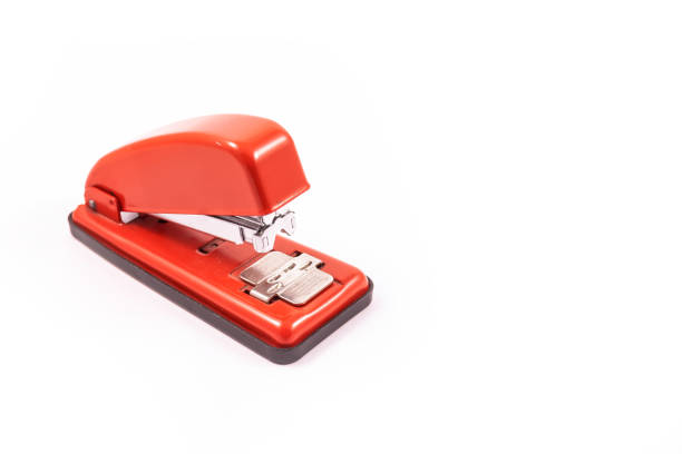 Office stationery stapler for papers isolated on a white background stock photo
