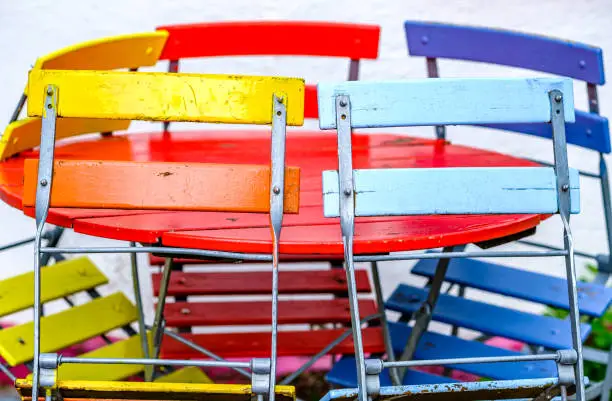 colorful folding chairs at a beergarden - photo