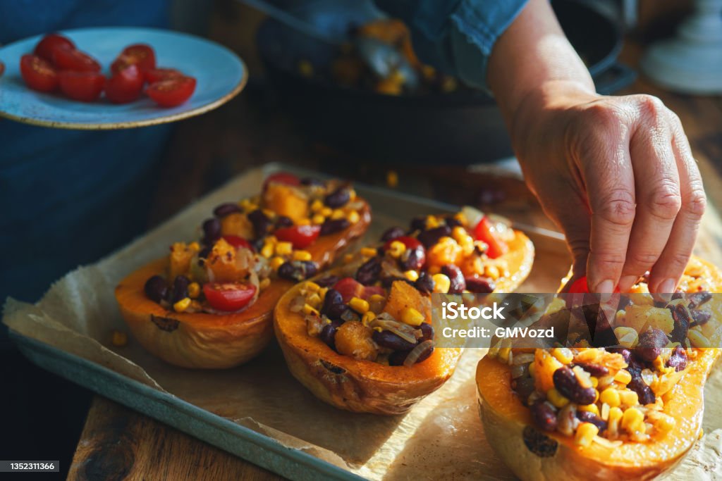 Preparing Burrito Butternut Squash Boats Preparing Burrito Butternut Squash Boats Filled with Ground Beef, Corn and Kidney Beans Squash - Vegetable Stock Photo