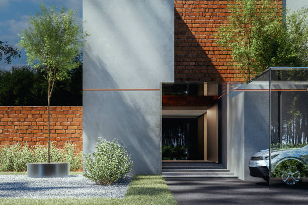 istock Modern house driveway with parked car 1352311467