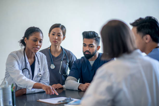 istock Medical Staff Discussing a Patients Test Results 1352311790