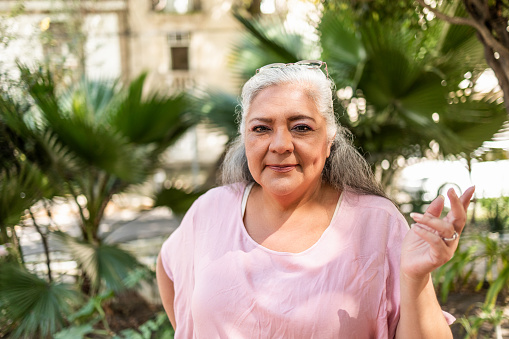 Portrait of confident Hispanic woman looking at the camera