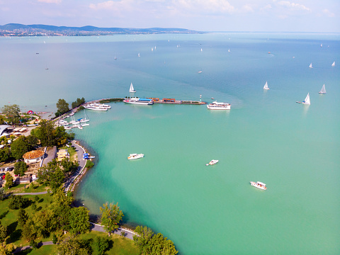 Aerial view of the city of Tihany in the background on Lake Balaton and the sailing boats in the Balaton upland in Hungary