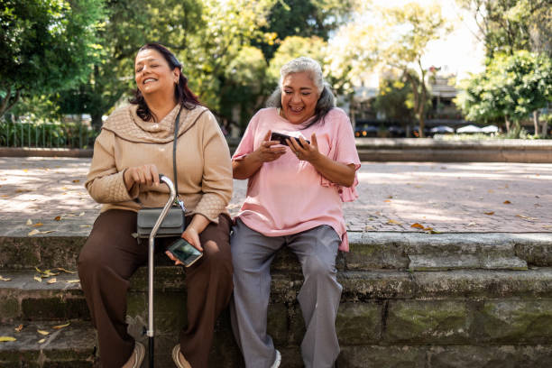 istock Senior women using mobile phone 1352314259