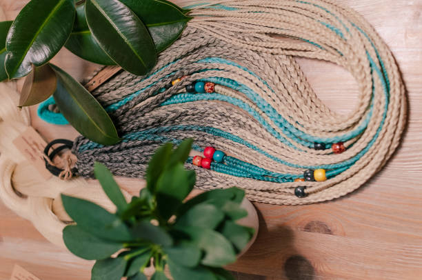 istock Colored braids in natural shades, hair accessory 1352318370