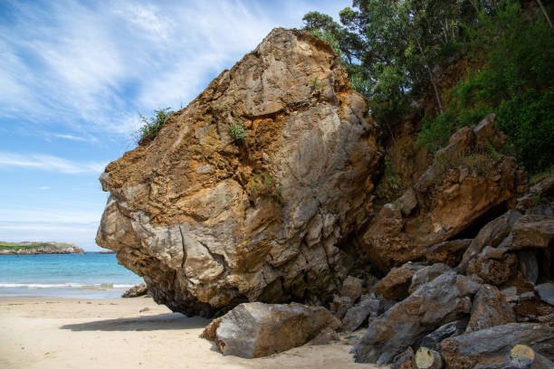 istock Stones in the beach coast 1352318568