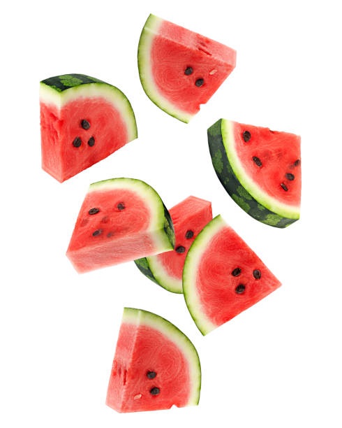 falling watermelon isolated on white background, clipping path, full depth of field - een stuk taart stockfoto's en -beelden