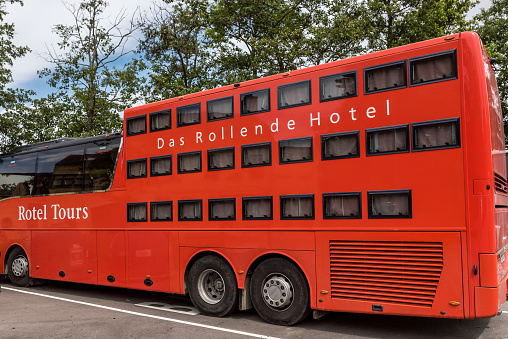a red triple deck Rotel bus for sleeping guests, Denmark, July 7, 2021