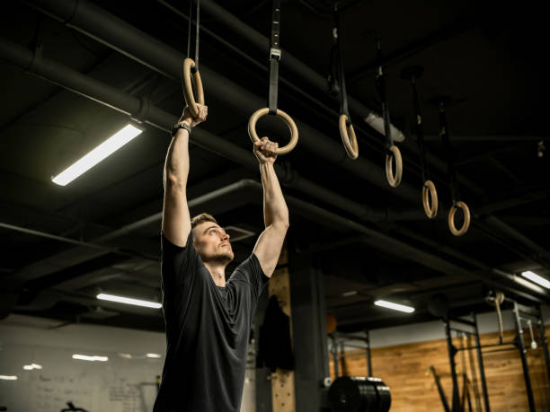 istock Man exercising in the Gym 1352321399