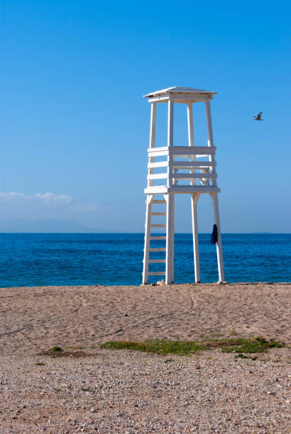 White life guard tower on clear sunny day