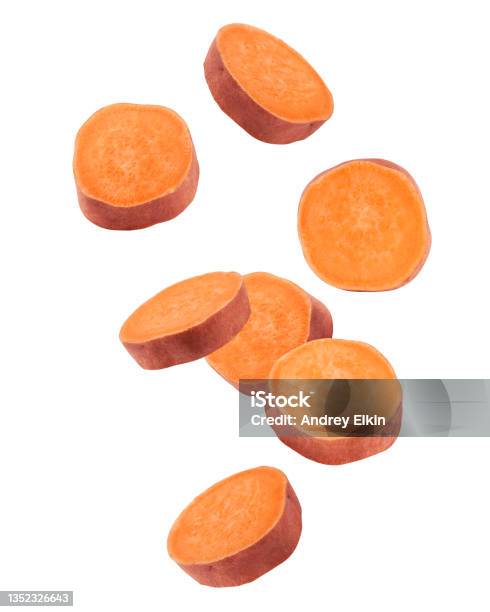 Falling Sweet Potato Slice Isolated On White Background Clipping Path Full Depth Of Field Stock Photo - Download Image Now