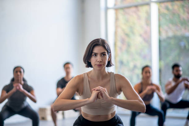 istock Squats During Fitness Class 1352333296