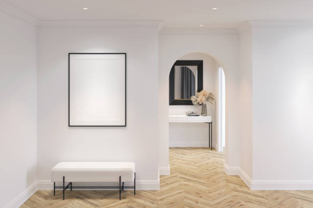 white hall in modern classic style with blank vertical poster illuminated by spotlight over a bench, parquet floor, ceiling with recessed lights, arch, mirror over console in the background. - house indoors lighting equipment ceiling imagens e fotografias de stock