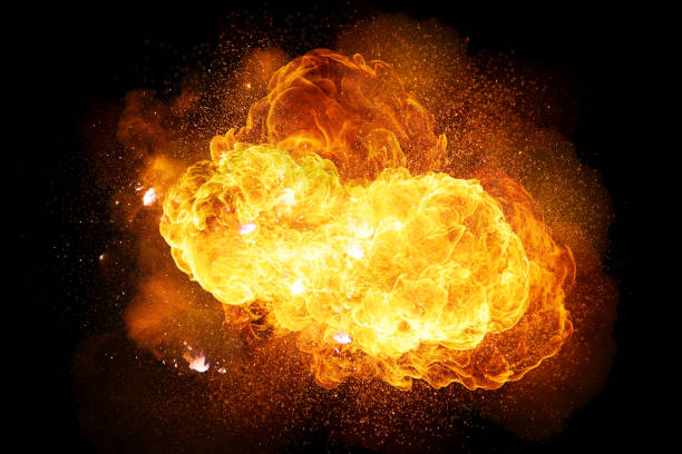 realistische feurige explosion mit funken und rauch isoliert auf schwarzem hintergrund - atombombenexplosion stock-fotos und bilder