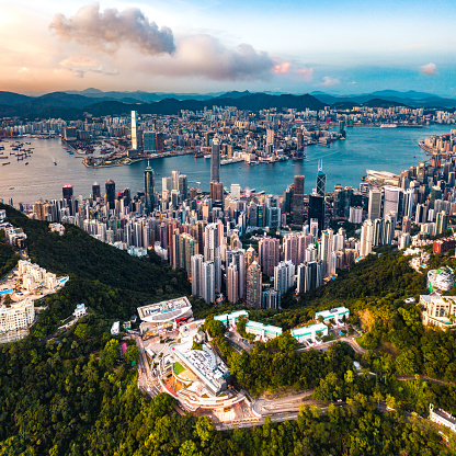 Aerial View of Hong Kong City and Victoria Harbour at sunset