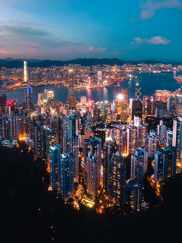 Aerial View of Hong Kong City and Victoria Harbour at sunset
