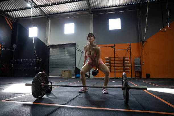 istock Female Weightlifting 1352345688