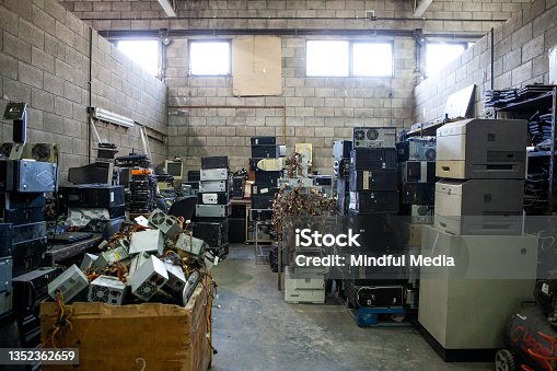 istock Recycling plant storage full of obsolete computer electronics equipment 1352362659