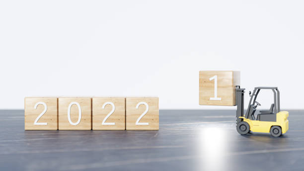 istock 3D Render. forklift lift up year 2021 wooden block on white background. 1352367950