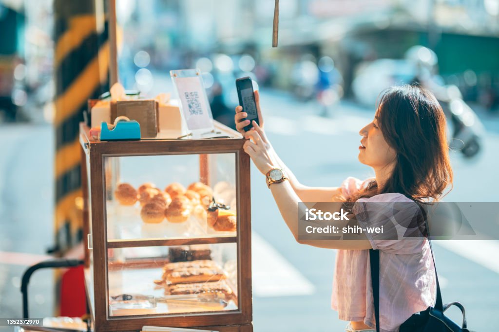Contactless payment for paying payment for paying by smartphone  - NFC technology QR Code Stock Photo