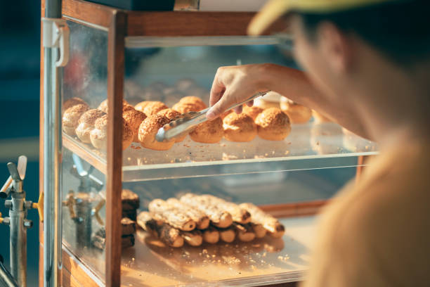 istock Street vendor selling cream puff 1352373131