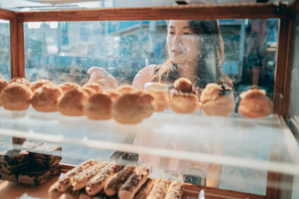 istock Guests buy cream puffs 1352373747