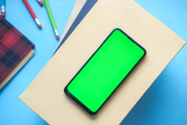 istock top view of smart phone and notepad on table 1352373843