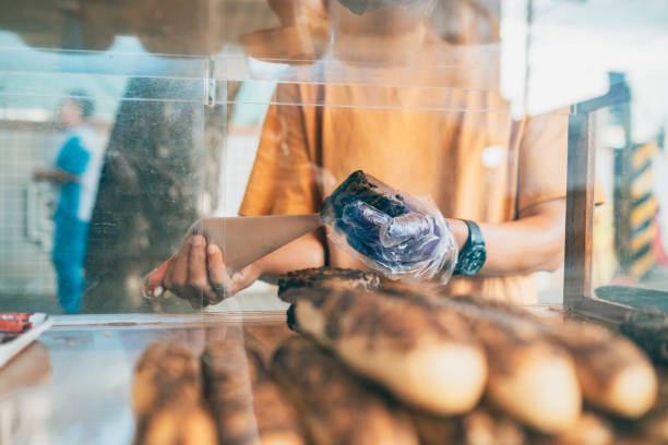 istock Street vendor selling cream puff 1352374034