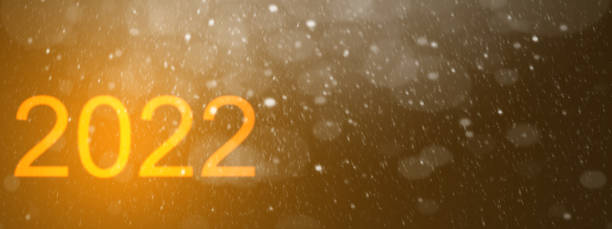 istock 2022 Golden and black glow new year background include light dark cloud smoke steamer and glitter 1352377805