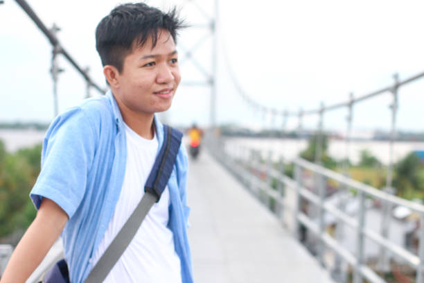 istock young men relaxing at flying bridge 1352380354