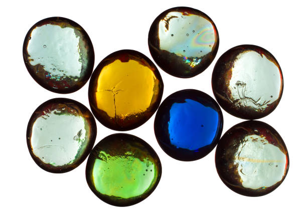 istock Drops of multi-colored glass on a white background. 1352389600